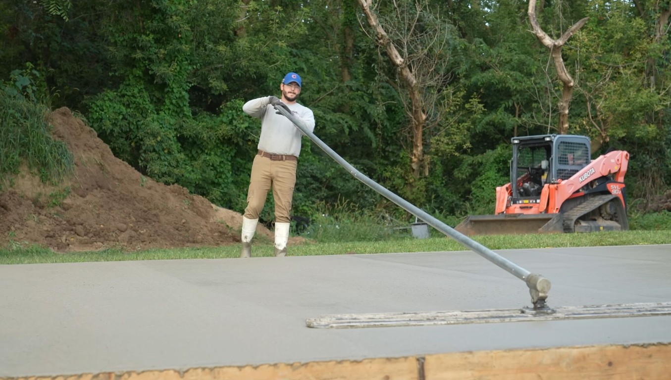 Professional concrete contractor working on a residential project in Cleburne, TX